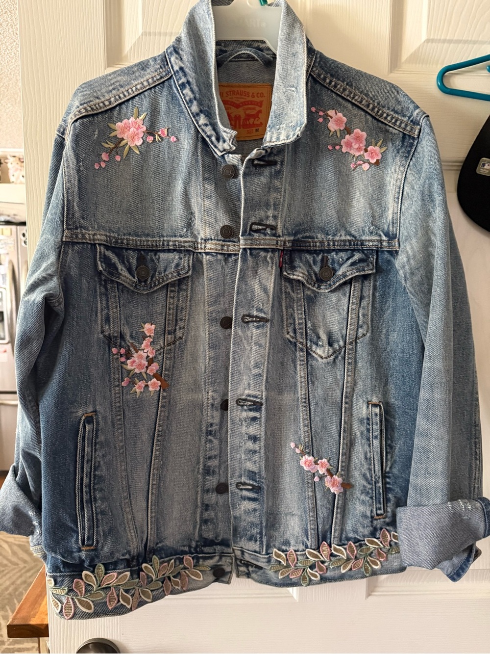 Levi's Light Blue Denim Jacket with Pink Floral Embroidered Accents